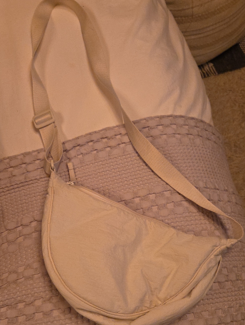 Uniqlo Crescent Crossbody Bag in Cream